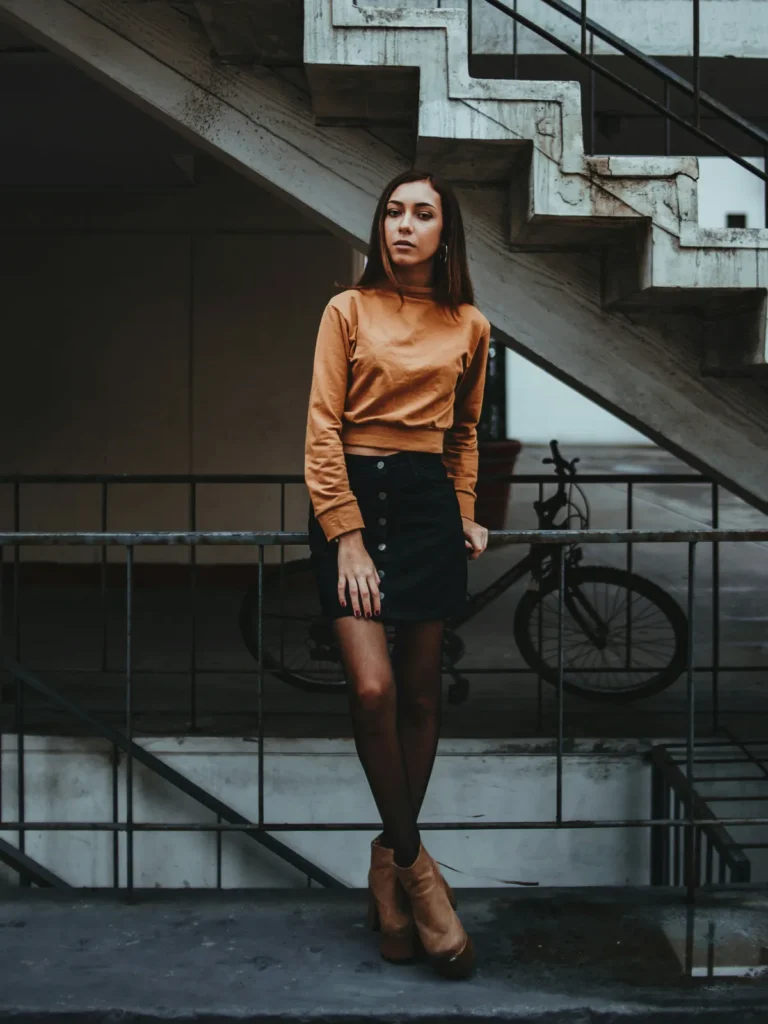 denim skirt with brown blouse
