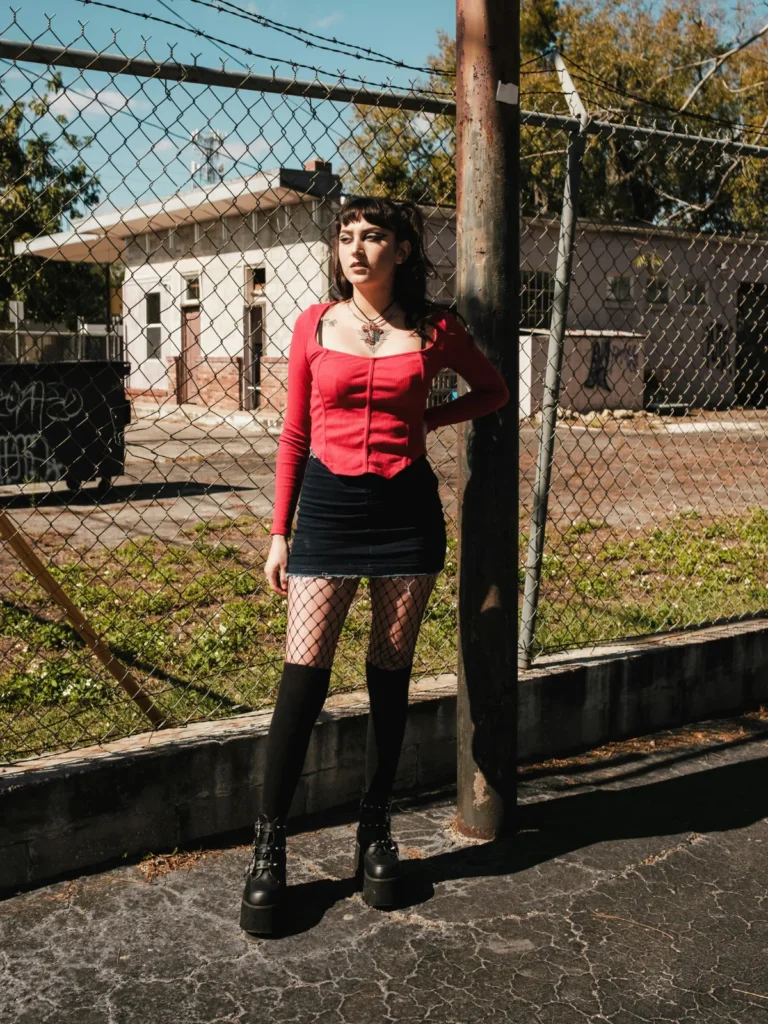 denim skirt with red blouse